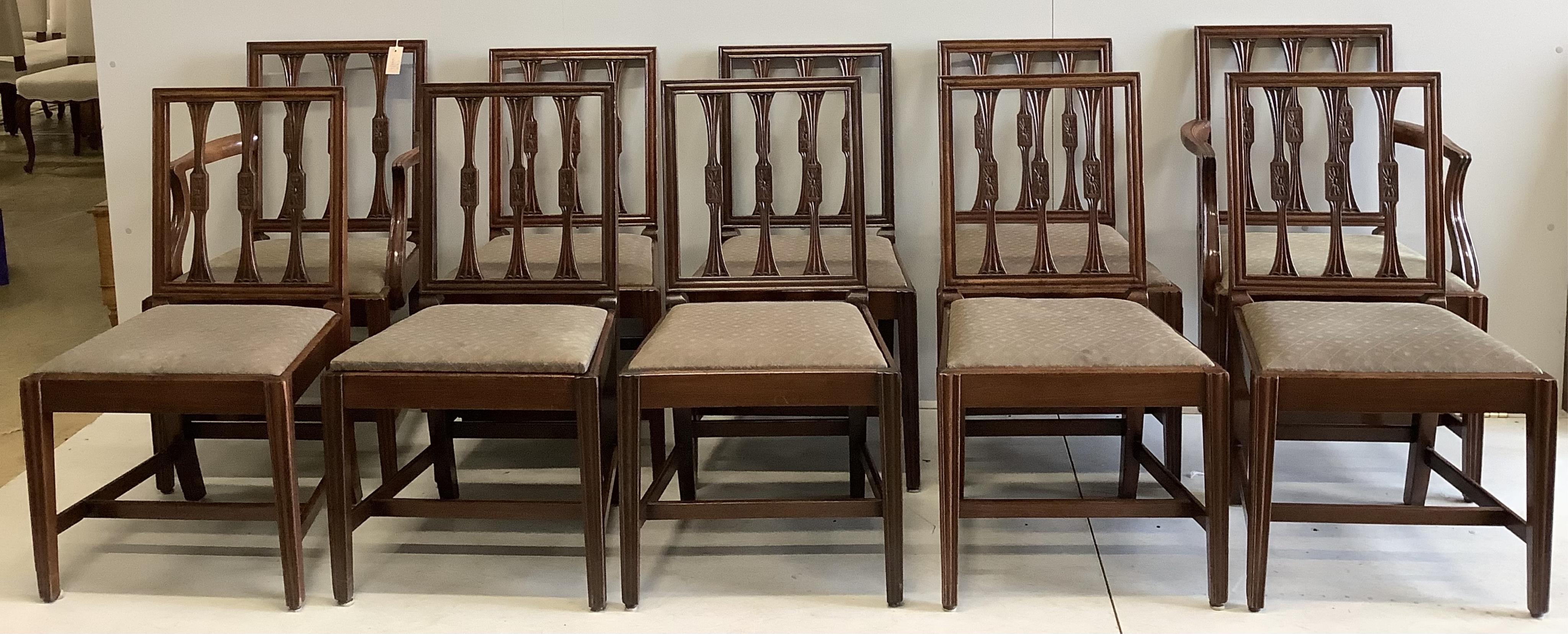 A set of ten Sheraton style mahogany dining chairs, two with arms together with a reproduction banded mahogany twin pillar extending dining table, 300cm extended, depth 91cm, height 72cm. Condition - fair to good